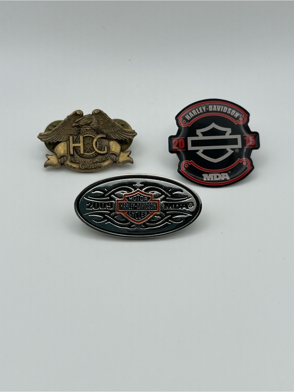 Harley-Davidson Collectible Pin Trio – Black, Red, Gold